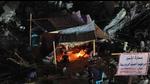 Palestinians sit in a tent set up on top of the ruins of a building destroyed in recent Israeli air strikes, in Gaza. (AFP) Palestinians sit in a tent set up on top of the ruins of a building destroyed in recent Israeli air strikes, in Gaza. (AFP)