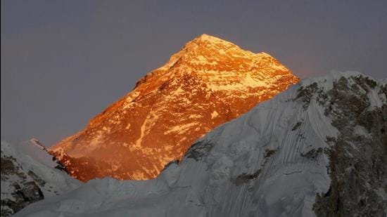 A file photo of Mount Everest as seen from the way to Kalapatthar in Nepal. China recently said it would draw a “separation line” atop Mount Everest to prevent the coronavirus from being spread by climbers ascending Nepal's side of the mountain. (AP) A file photo of Mount Everest as seen from the way to Kalapatthar in Nepal. China recently said it would draw a “separation line” atop Mount Everest to prevent the coronavirus from being spread by climbers ascending Nepal's side of the mountain. (AP)