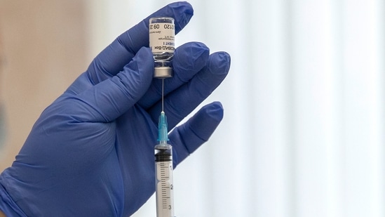 A medical worker prepares a shot of Russia's Sputnik V coronavirus vaccine.(AP) A medical worker prepares a shot of Russia's Sputnik V coronavirus vaccine.(AP)