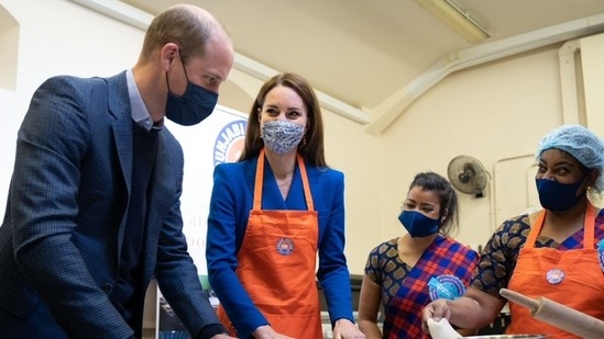 Prince William, second-in-line to the throne, and Kate are seen taking instructions from members of Sikh Sanjog. (Twitter / @KensingtonRoyal) Prince William, second-in-line to the throne, and Kate are seen taking instructions from members of Sikh Sanjog. (Twitter / @KensingtonRoyal)