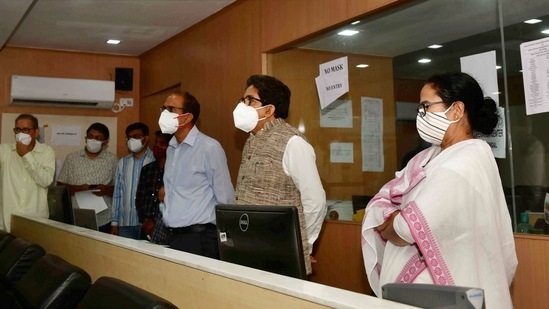 Chief minister Mamata Banerjee visits the control room set up to monitor the situation of cyclone Yaas at Nabanna in Kolkata. (PTI)