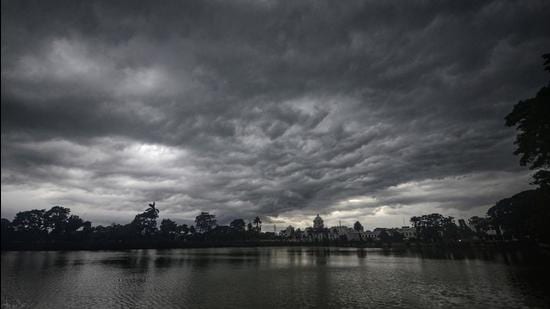File photo: Storm clouds hover over the Royal Palace in Agartala ahead of cyclone Yaas. (PTI)