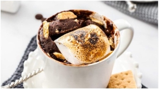 Cake: This is a life-saving recipe for all your sweet cravings. In a mug, add 3 tablespoon flour, 2 tablespoon sugar, 2 tablespoon cocoa powder, 1/4 teaspoon baking powder, a pinch of salt and mix well. Then add 3 tablespoon milk, 1/2 teaspoon vanilla essence, 2 tablespoon vegetable oil and mix properly till it turns into a smooth batter-like consistency. Add a few chocolate chunks and stir for the last time. Microwave this batter for 1 minute and you are done.(Instagram/inkerythe)