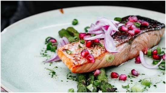 Foods packed in omega 3 fatty acids like fish, pastured eggs, soybeans and soy products, nuts and seeds, spinach, etc., are believed to fight acne.(Unsplash)