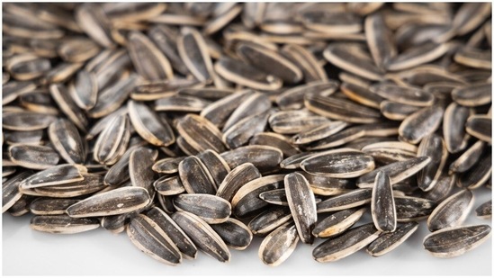 Having foods rich in vitamin a and e may lessen the severity of your acne. These foods include sunflower seeds, peanuts, almonds, pumpkin, etc.(Unsplash)