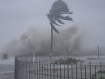 Heavy winds and sea waves hit the shore at Digha beach on the Bay of Bengal coast as Cyclone Yaas intensified on May 26. Cyclone Yaas pounded the beach towns in north Odisha and neighbouring West Bengal as it hit the coast around 9 am on May 26 with a wind speed of 130-140 kmph, inundating the low-lying areas amid a storm surge, HT reported.(Ashim Paul / AP)