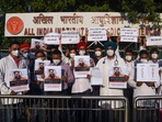 Resident doctors of AIIMS stage a protest against Ramdev over his remarks on allopathy in New Delhi. (ANI Photo) Resident doctors of AIIMS stage a protest against Ramdev over his remarks on allopathy in New Delhi. (ANI Photo)