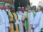 BKU leader Rakesh Tikait with others during ongoing farmers' protest against three farm reform laws, at Ghazipur border in New Delhi, Tuesday, May 25, 2021. (PTI) BKU leader Rakesh Tikait with others during ongoing farmers' protest against three farm reform laws, at Ghazipur border in New Delhi, Tuesday, May 25, 2021. (PTI)