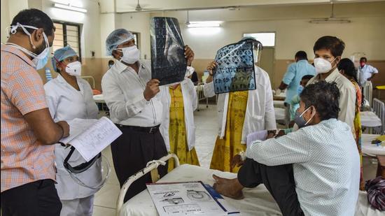 Doctors treat a Black Fungus infected patient at a ward of a government hospital. Bihar made mucormycosis a notifiable disease on May 22. (PTI PHOTO.)