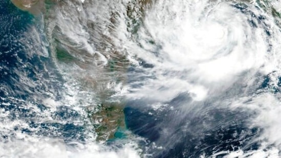 Tens of thousands of people are being evacuated from low-lying areas of two Indian states to escape the strong cyclone barreling toward the eastern coast. (AP)