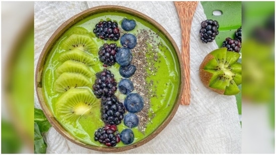 Green smoothie bowl: The ingredients used here are 1 cup spinach, 1 cup pineapple, 1/2 orange, 1/4 of an avocado, 1/4 cup water. Blend all the ingredients in a blender and serve in a bowl. For toppings add kiwi, shredded coconut and some almonds.(Unsplash)