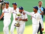 File Photo of Indian team youngster celebrating with the 2020-21 Border Gavaskar Trophy in Brisbane. (File) File Photo of Indian team youngster celebrating with the 2020-21 Border Gavaskar Trophy in Brisbane. (File)