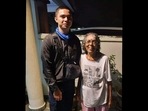 A picture of the Grab delivery boy with the customer's mother(Facebook/ Pate Othman) A picture of the Grab delivery boy with the customer's mother(Facebook/ Pate Othman)