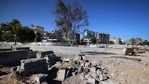 "If found to be indiscriminate and disproportionate, such attacks might constitute war crimes," Michelle Bachelet said. In picture - Damage around tombs in the old Shujaiya cemetery in Gaza City.(AFP) "If found to be indiscriminate and disproportionate, such attacks might constitute war crimes," Michelle Bachelet said. In picture - Damage around tombs in the old Shujaiya cemetery in Gaza City.(AFP)