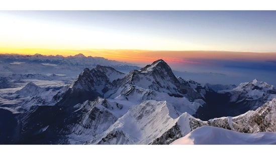 Dawn that day was a special gift. Not only did it offer some “once in several generations” views but the optimistic excitement about the summit being within striking distance. This is a majestic view of Mt Makalu, one of the 14 peaks higher than 8000m in the world. We had been going for about 10 hours by this time and I don’t know what was energizing me, but it felt “comfortable” in the given context. I got this quick shot from just under the South Summit. The winds were calm the sky was clear and Sagarmatha seemed like a friendly planet. I wish there was the time and opportunity to absorb these moments while on the climb, but out there it is just the tough ask of putting one foot ahead of the other, 5 to 7 gasps at a time.(Aditya Gupta)