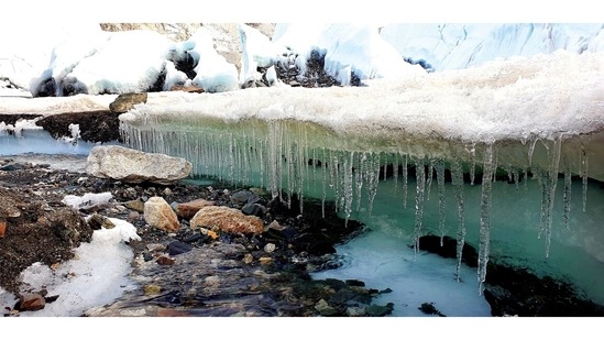 Water droplets get arrested by the wind to become ice before they run out to the stream below.(Aditya Gupta)