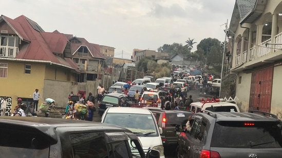 Residents were advised to carry very little, that they could not return to their homes until advised by authorities and that vehicles will be provided to help with the evacuation. In picture - Traffic clogs a main road as residents try to flee Goma, Congo.(AP)