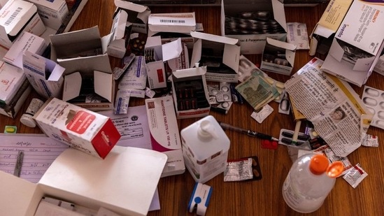 Capsules and other medical items seen at the government dispensary in Kaljikhal,on May 23. Devi had tested positive for Covid-19 with very low blood oxygen levels. Aishwary Anand, the only doctor at the dispensary had advised Kumar to take her to a bigger hospital, but costs were a deterrent.(Danish Siddiqui / REUTERS)