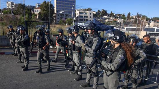 Tensions between Israel and Palestinians that lead to military violence initially flared in the Sheikh Jarrah neighbourhood of occupied east Jerusalem, where Israeli police cracked down on people protesting the planned expulsion of Palestinian families from their homes so Jewish settlers could move in. (AFP)