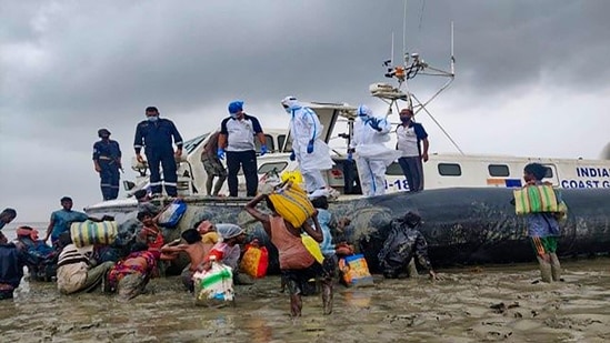 Indian Coast Guard personnel carry out rescue and relief works during landfall process of Cyclone Yaas in Odisha.(PTI) Indian Coast Guard personnel carry out rescue and relief works during landfall process of Cyclone Yaas in Odisha.