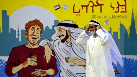 A large piece of artwork in the courtyard depicted an Emirati man in traditional garb with his arm on the shoulder of an Israeli as they laughed and shared coffee under the word “cousins" written in Arabic and Hebrew. (AP Photo/Kamran Jebreili)(AP)