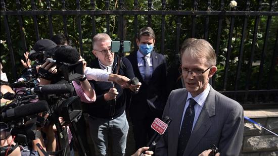 Australian Ambassador to China Graham Fletcher speaks to journalists outside the Beijing Second Intermediate People’s Court on Thursday. (AFP) Australian Ambassador to China Graham Fletcher speaks to journalists outside the Beijing Second Intermediate People’s Court on Thursday. (AFP)