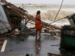 A woman stands next to her stall damaged by heavy winds due to Cyclone Yaas in Odisha's Balasore district.(Rupak De Chowdhuri / REUTERS) A woman stands next to her stall damaged by heavy winds due to Cyclone Yaas in Odisha's Balasore district.(Rupak De Chowdhuri / REUTERS)