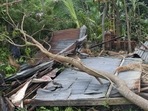 Damaged house and uprooted trees are seen in the aftermath of Cyclone Yaas in West Bengal's North 24 Parganas.(ANI Photo) Damaged house and uprooted trees are seen in the aftermath of Cyclone Yaas in West Bengal's North 24 Parganas.(ANI Photo)