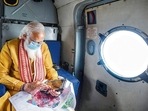 PM Modi on an aerial tour of the cyclone-hit areas on Friday. PM Modi on an aerial tour of the cyclone-hit areas on Friday.