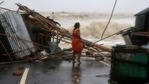A woman stands next to her stall damaged by heavy winds due to Cyclone Yaas in Odisha's Balasore district.(Rupak De Chowdhuri / REUTERS) A woman stands next to her stall damaged by heavy winds due to Cyclone Yaas in Odisha's Balasore district.(Rupak De Chowdhuri / REUTERS)