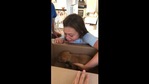 The girl picking up the puppy from the box. (Reddit/Spudfox64) The girl picking up the puppy from the box. (Reddit/Spudfox64)