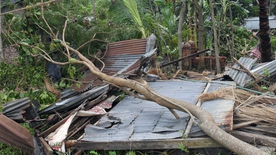 Damaged house and uprooted trees are seen in the aftermath of Cyclone Yaas in West Bengal's North 24 Parganas. (ANI Photo) Damaged house and uprooted trees are seen in the aftermath of Cyclone Yaas in West Bengal's North 24 Parganas. (ANI Photo)