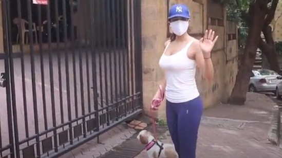 Sophie Choudry spotted with her pet dog outside her Mumbai apartment.(Varinder Chawla)
