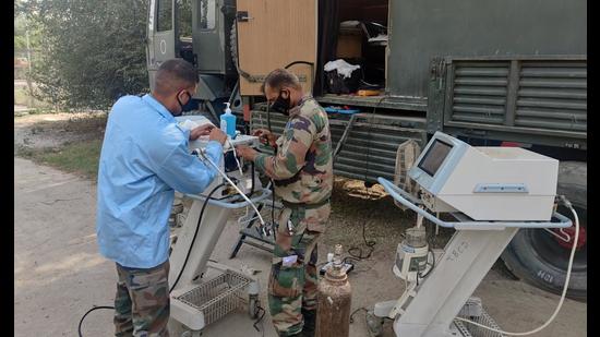Army personnel repairing medical equipment at Faridkot government hospital on Friday. (HT Photo)