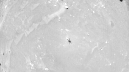 This photo made available by NASA shows the shadow of the Ingenuity Mars Helicopter captured by the aircraft's navigation camera.(NASA/JPL-Caltech via AP)