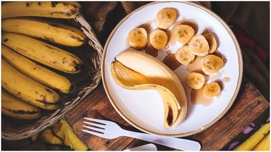 Banana face mask: This fruit is packed with vitamins and minerals like vitamin A, B, E, and F, as well as magnesium, zinc, iron, and potassium. Mash a banana in a bowl till it turns into a paste. Apply it evenly on your face, neck and leave it overnight. Wake up in the morning and wash off the mask to get hydrated skin.(Unsplash)