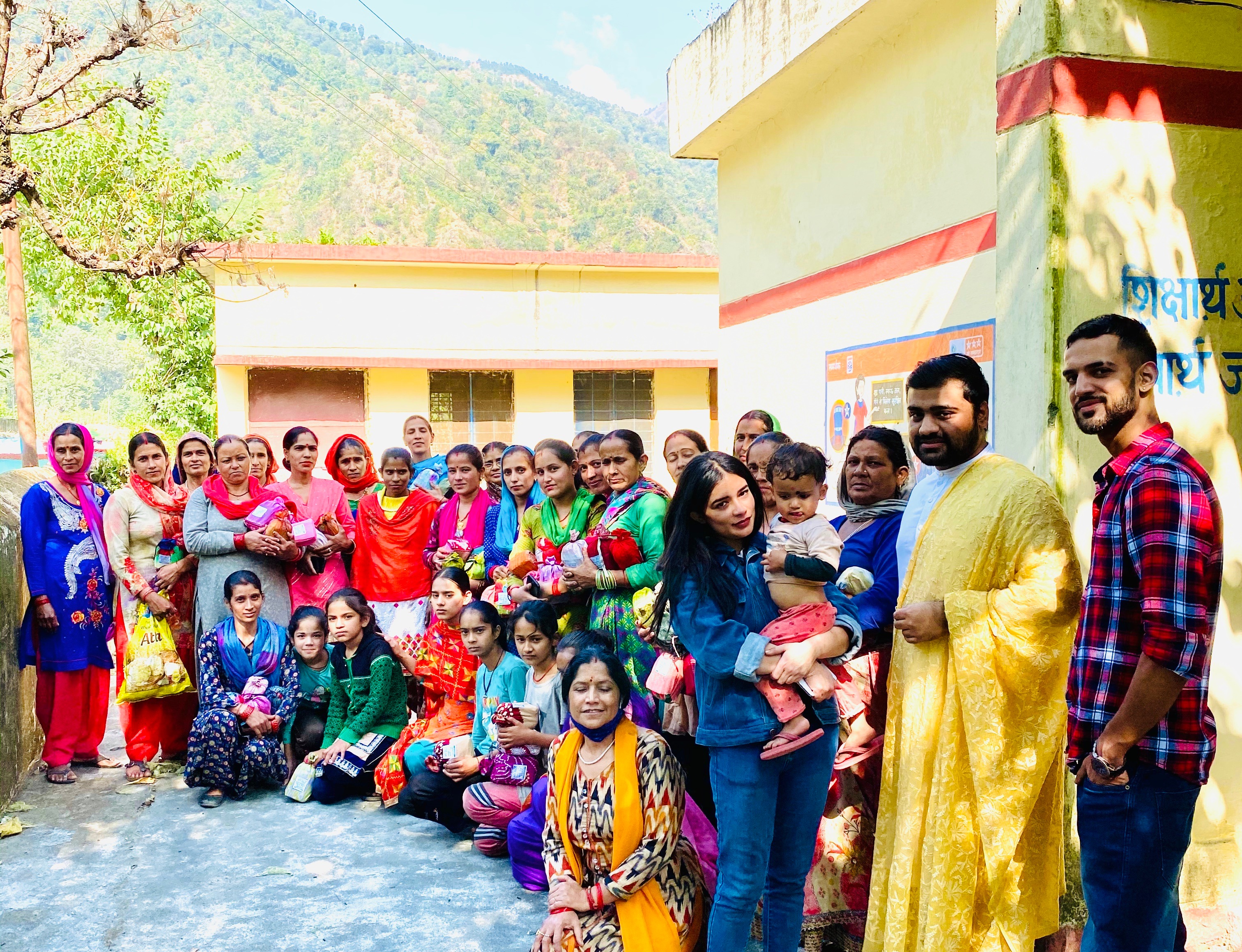 Anurag Chauhan (yellow shawl) and his colleagues during a workshop on menstrual hygiene in a village in Uttarakhand. (HT Photo) Anurag Chauhan (yellow shawl) and his colleagues during a workshop on menstrual hygiene in a village in Uttarakhand. (HT Photo)