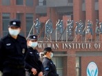 Security personnel keep watch outside the Wuhan Institute of Virology in Hubei province, China.