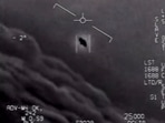 The image shows part of an unclassified video taken by Navy pilots showing interactions with "unidentified aerial phenomena". The image shows part of an unclassified video taken by Navy pilots showing interactions with "unidentified aerial phenomena".