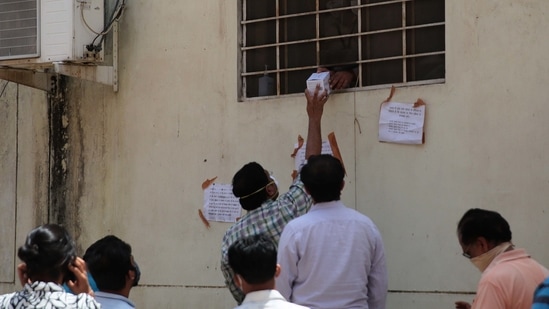 Relatives of Covid-19 patients receive their allotted quota of Remdesivir injections, at Chief Medical and Health Officer's office in Jaipur, (Photo by Himanshu Vyas/ Hindustan Times)