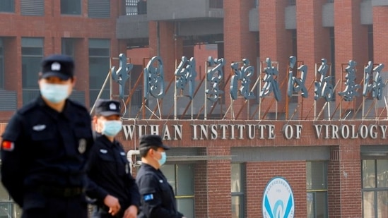 Security personnel keep watch outside the Wuhan Institute of Virology in Hubei province, China.(Reuters / File)