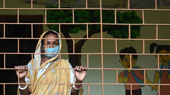 In Dhenkanal district, which is clocking TPR of around 37%, the highest in Odisha over the past one week, 96 people in Barsinga village of Hindol block tested positive after attending a community feast. (AFP representative image) In Dhenkanal district, which is clocking TPR of around 37%, the highest in Odisha over the past one week, 96 people in Barsinga village of Hindol block tested positive after attending a community feast. (AFP representative image)