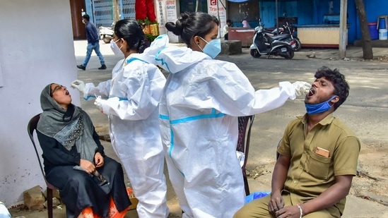 Medical workers collect samples for Covid-19 testing during lockdown in Bengaluru (PTI Photo) Medical workers collect samples for Covid-19 testing during lockdown in Bengaluru (PTI Photo)