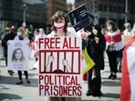 A woman holds a poster during a demonstration demanding the freedom of Belarus opposition activist Raman Protasevich in Berlin.(AP) A woman holds a poster during a demonstration demanding the freedom of Belarus opposition activist Raman Protasevich in Berlin.(AP)