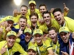 Australian team with World Cup 2015 trophy (L), Former Australian spinner Xavier Doherty (R)