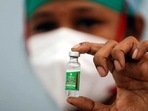 A nurse displays a vial of Covishield, the Covid-19 vaccine being manufactured by the Serum Institute of India, at a medical centre in Mumbai. (File Photo) A nurse displays a vial of Covishield, the Covid-19 vaccine being manufactured by the Serum Institute of India, at a medical centre in Mumbai. (File Photo)
