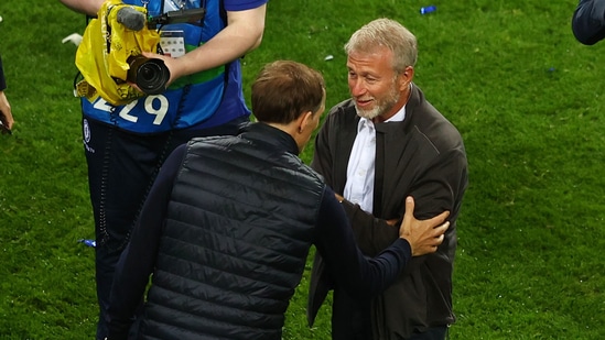Chelsea manager Thomas Tuchel celebrates with owner Roman Abramovich after winning the Champions League. (Pool via REUTERS)