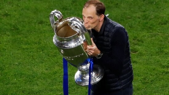 Chelsea manager Thomas Tuchel celebrates with the trophy.(Pool via REUTERS)