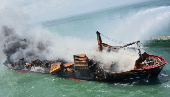 Smoke billowing from the Singapore-registered container ship MV X-Press Pearl, which has been burning for the tenth consecutive day in the sea off Sri Lanka's Colombo Harbour, in Colombo. Picture taken on May 29, 2021. (AFP) Smoke billowing from the Singapore-registered container ship MV X-Press Pearl, which has been burning for the tenth consecutive day in the sea off Sri Lanka's Colombo Harbour, in Colombo. Picture taken on May 29, 2021. (AFP)