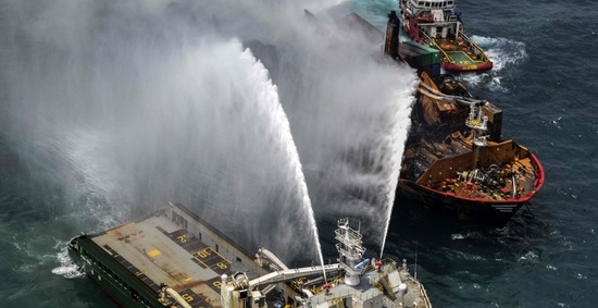 smoke billowing from the Singapore-registered container ship MV X-Press Pearl, which has been burning for the eleventh consecutive day as vessels try to douse off the fire, in the sea off Sri Lanka's Colombo Harbour, in Colombo.(AFP) smoke billowing from the Singapore-registered container ship MV X-Press Pearl, which has been burning for the eleventh consecutive day as vessels try to douse off the fire, in the sea off Sri Lanka's Colombo Harbour, in Colombo.(AFP)